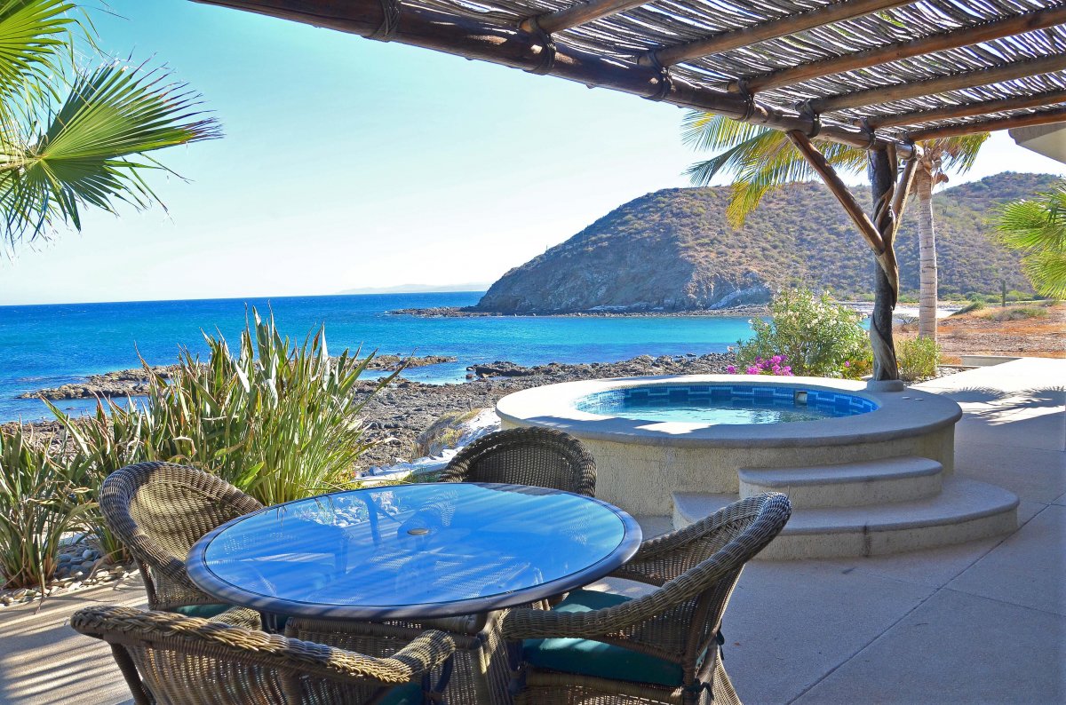 Patio with jacuzzi and ocean view