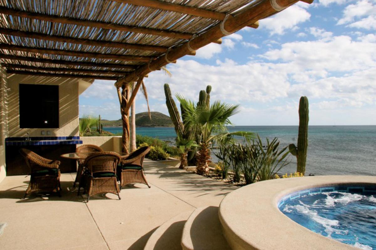 Patio with jacuzzi and ocean view